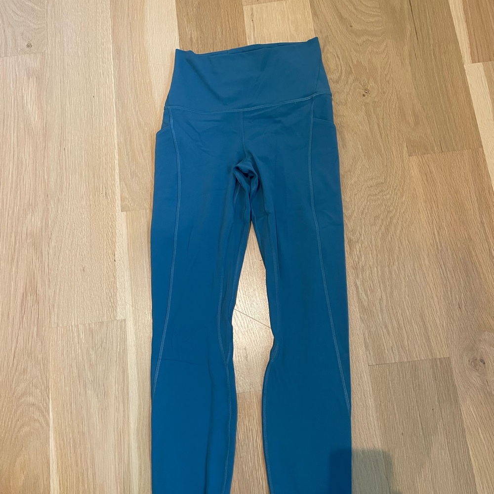 Lululemon leggings- Great condition barely worn- Size 2- pockets on side-